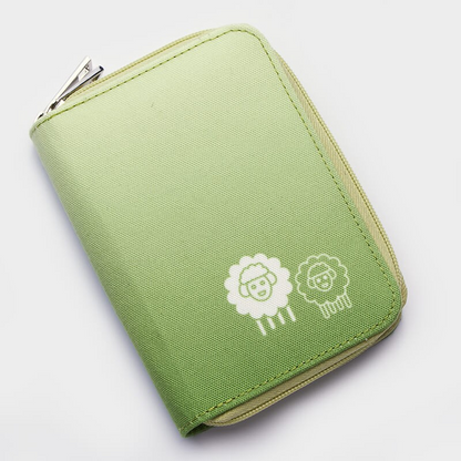 green needles case with 2 sheep